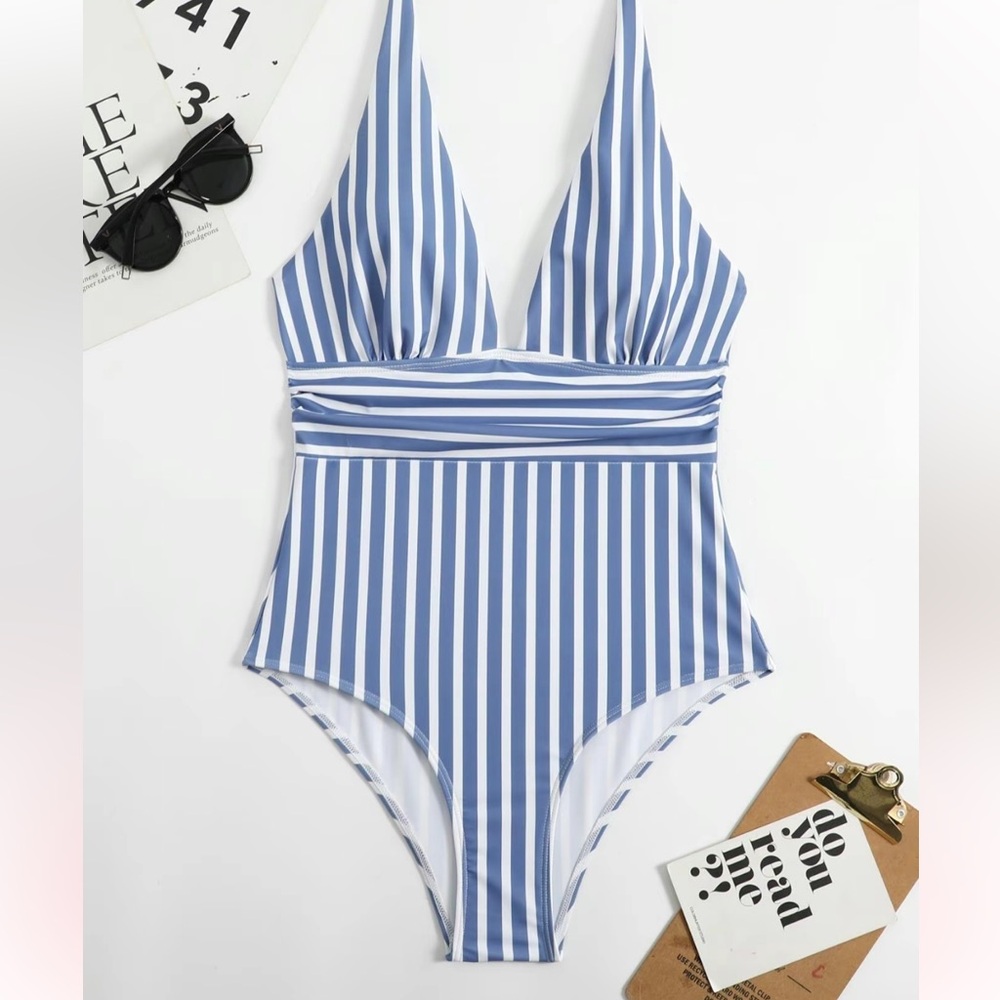Classic design in this blue and white striped one piece swimsuit in size large